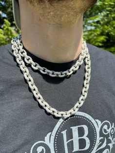 Men's 12mm wide iced rolo chain set with moissanite stones
Also knows as Hermes link
 
 
REAL VVS D Color MOISSANITE
Comes with GRA Certificate
PASSES DIAMOND TESTER!!! ANY PEN OR LIGHT TRANSMISSION DIAMOND TESTER (Will show up as moissanite and not diamond on lab assays however)
40.5-67.8ct (depending on length...for instance 24" is 54.1ct) genuine D Color VVS excellent cut moissanite stones..SO ICY THEY WILL BLIND YOU!...Iced on all sides as this is a rolo chain!
 
&nbs White Chain Jewelry For Streetwear, White Iced Out Chain Link Jewelry, Iced Out White Chain Link Jewelry, White Iced Out Cuban Link Necklace, Iced Out White Cuban Link Necklace, White Iced Out Chain Link Necklace, White Diamond Cuban Link Necklace, White Bling Jewelry For Streetwear, White Bling Necklaces For Streetwear