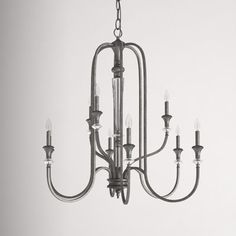 a chandelier with six lights hanging from it