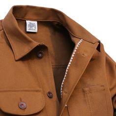 The Railcar Chore Coat is a perfect year round garment. This new Fall 2019 release is richer in color then it's predecessor. While being in the same color shade, the new 12 ounce fabric has more color saturation. The coats are cut and sewn in the Railcar workshop in California out of a tough and breathable 12 ounce duc Gabardine Pea Coat With Pockets, Long Sleeve Gabardine Pea Coat With Pockets, Camp Collar Outerwear With Buttons For Work, Fall Workwear Utility Jacket With Double-needle Stitching, Fall Utility Jacket With Double-needle Stitching For Workwear, Utility Long Sleeve Gabardine Outerwear, Utility Gabardine Long Sleeve Outerwear, Utility Style Gabardine Outerwear, Fall Utility Jacket With Pockets In Gabardine