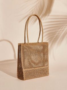 This Summer Style Essential is a must-have for any woman. Made from durable straw, it is the perfect accessory for the warmer months. Its solid design adds a touch of sophistication while its size is spacious enough to store all your essentials. Stay stylish and organized with this straw bag. Color : Beige Bag Size : Small Style : Vacation Type : Straw Bag Pattern Type : Plain Closure Type : No-closure Magnetic : No Material : Paper Care Instructions : Do not wash Size Bag Height Bag Length Bag Width Handle Height one-size 35 31 12 27 Everyday Lightweight Jute Bag, Lightweight Everyday Jute Bag, Rectangular Straw Bag In Neutral Color, Lightweight Beige Rectangular Straw Bag, Rectangular Neutral Straw Bag, Rectangular Neutral Straw Bags, Eco-friendly Packable Rectangular Bag, Eco-friendly Rectangular Packable Bag, Lightweight Natural Rectangular Shoulder Bag