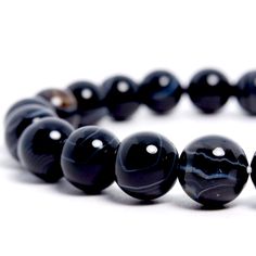 New Black Banded Agate 8mm Healing Gemstone Bracelet Growth / Balance / Confidence. The Banded Agate Stone Is The Stone Of Beauty, Harmony And Fertility. It Increases Self-Confidence And Is Incredibly Supportive For Health And Wellbeing. Helping To Restore The Balance Of The Body & Mind, Especially The Digestive System. Actual Colors May Slightly Vary Black Agate Stretch Bracelet Gift, Black Agate Beaded Bracelet With Natural Stones, Black Agate Beaded Bracelets With Natural Stones, Black Agate Crystal Bracelet For Gift, Black Agate Crystal Bracelet Gift, Black Agate Round Crystal Bracelet, Black Agate Crystal Bracelet With 8mm Beads, Black Agate Bracelet With 8mm Beads, Black Agate Bracelets For Healing