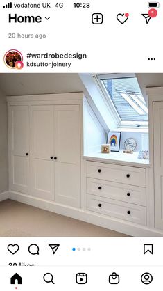 an image of a bedroom with white cupboards and windows on the wall above it