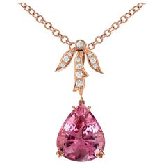 A gorgeous pear shaped 10.87 carat Baby Pink Tourmaline is set in a 0.25 carat diamond necklace. This Pink Tourmaline pendant necklace is crafted in 18K rose gold. Returns are accepted and paid by us within 7 days of delivery. Color alternatives for Pink Tourmaline diamond necklaces are Ruby pendant, Pink Sapphire pendant, Red Spinel pendant, Pink Spinel pendant. Tourmaline is the birthstone for October and it is also the celebrated 8th Anniversary gemstone. The most popular Tourmaline varieties include, Paraiba Tourmaline, Chrome Tourmaline, Green and Mint Tourmaline, Pink Tourmaline, and Rubellite. Please FOLLOW the TAMIR and the MERKABA storefronts to be the first to view the latest of our ultra exclusive jewels and supreme gemstones. Birthday Vacation, Tourmaline Pendant, Tourmaline Necklace, Pure Water, Faux Pearl Necklace, Gold Tone Necklace, Anniversary Party, Gold Plated Necklace, Water Drop