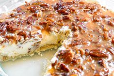 a pecan pie is cut in half on a plate