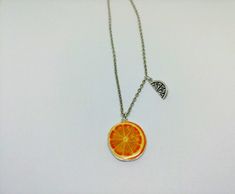 "This listing is for one fruit necklace. Your choice of Strawberry, Orange, or Pineapple! These necklaces are great for those summer beach vibes all year round. The main center charm is silver plated photo realistic and about the size of a quarter (give or tank) and the secondary charm varies but is smaller than the main, colorful charm. To see an example of how these lay look at the last potato quality photo! I keep the main fruit free sliding but I lock the smaller fruit charm for a layered bu Sterling Silver Necklace For Summer Gifts, Summer Fruit Design Jewelry Gift, Summer Fruit Design Jewelry As Gift, Fruit Design Jewelry As Summer Gift, Summer Nickel Free Necklaces As Gift, Nickel-free Necklaces As Summer Gifts, Nickel Free Necklaces As Summer Gift, Silver Charm Necklace For Summer Gift, Silver Charm Necklaces For Summer Gifts