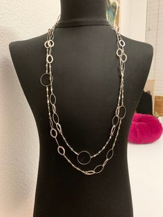 Vintage 1980s silver tone Extra long Chain Necklace with oval and circular design Very cool necklace Great Vintage Condition Can be worn as a long necklace or can be doubled up Comes in a gift box As is Ships Immediately Formal Long Metal Chain Necklace, Long Layered Silver Chain Necklace, Elegant Silver Long Necklace, Formal Long Silver Chain Necklace, Silver Long Chain Necklace For Formal Occasions, Silver Oval Chain Necklace, Formal Metal Long Chain Necklace, Long Silver Chain Layered Necklace, Party Long Silver Chain Necklace