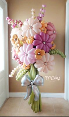 a bouquet of flowers in the shape of balloons