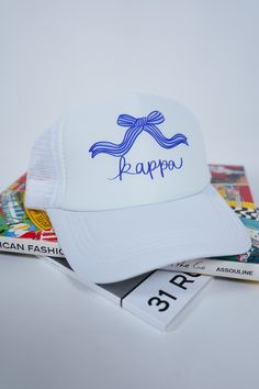 Snap on this white trucker hat for a fun and functional addition to your sorority ensemble. Perfect for showing off your unique style, the snap closure makes for easy adjustments. Join the sisterhood and complete your look with this Sorority Trucker Hat! Trendy White Adjustable Snapback Hat, White Fun Trucker Hat For Spring, Trendy White Trucker Hat With Letter Print, Fun White Snapback Hat For Spring, Fun White Snapback Hat With Letter Print, Cute White Adjustable Snapback Hat, Cute Adjustable White Snapback Hat, White Fun Snapback Hat With Curved Bill, Cute White Snapback Hat With Curved Brim