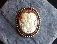 Daughters cameo brooch brown cameo brooch by DelicateIndustry1 Collectible Cabochon Brooches, Cameo Brooches For Wedding, Antique Cameo Brooches As Gift, Antique Cameo Brooches For Gift, Anniversary Oval Brooches, Cabochon Brooches As A Gift, Victorian Style Brooches For Gift, Oval Cameo Brooches As Gift, Marine City