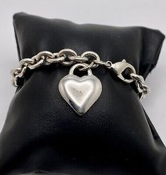 Silver tone Heart charm bracelet  | eBay Trendy Pendant Jewelry With Lobster Clasp, Trendy Pendant Charms Jewelry, Trendy Pendant Jewelry With Charms, Trendy Valentine's Day Jewelry With Heart Beads, Elegant Adjustable Charm Bracelet With Heart Pendant, Classic Bracelets With Charms For Valentine's Day, Dainty Adjustable Charm Bracelet With Heart Charm, Classic Charm Bracelets For Valentine's Day, Classic Chain Bracelet With Charms For Gift