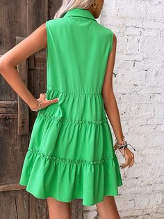 Features: Make a statement on vacation or day-to-day with the Madison Summer Casual Loose Sleeveless Ruffle Beach Dress. Crafted with a lightweight fabric, this dress will keep you feeling cool while looking fashionable. Its elegant design features a ruffle hem and green button detailing. Stay comfortable and stylish all summer long. Sleeveless Ruffled Sundress For Summer Outings, Casual Ruffle Sleeveless Dress For Vacation, Summer Sleeveless Dress With Ruffles For Beach Season, Casual Tiered Mini Dress For Summer, Green Ruffled Sleeveless Dress For The Beach, Green Ruffled Sleeveless Beach Dress, Green Sleeveless Dress With Ruffles For Beach, Green Sleeveless Ruffle Dress For Beach, Tiered Sleeveless Dress For Summer Spring