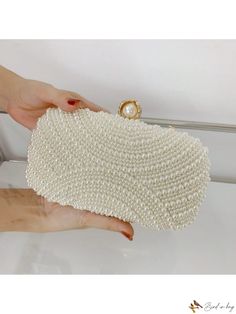 Bird in Bag - Exquisite Handcrafted Vintage Pearl Clutch Bag with Box Shape Design, Elegantly Adorned with Pearls and Artificial Diamonds, Featuring Glossy Faux Pearls - Ideal for Retro Style Soirees, Weddings, Banquets, Galas, and Celebratory Events. Versatile Design allows for Handheld, Crossbody, and Shoulder Wearing Options. Elegant Pearl Wedding Bags, Pearl White Clutch For Wedding, Gold Beaded Bridal Accessories For Formal Occasions, Cream Pearl Evening Bag For Wedding, Pearl White Evening Bag For Wedding, Elegant Evening Bag With Pearl Embroidery For Wedding, Beige Pearl Embellished Evening Bag For Wedding, Elegant Cream Bag For Ceremonies, Elegant Cream Bag For Ceremony