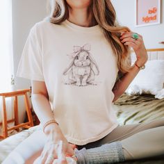 Cute Bunny Comfort Colors Boxy Crop Tee, Coquette Aesthetic Rabbit Shirt, Retro Easter Bunny T-Shirt, Girly Top, Gift For Her This cute oversized boxy t-shirt brings ample comfort and a laidback style that feels right at home in any occasion. With its 100% ring-spun cotton fabric, it feels soft, while the boxy fit with the slightly cropped, seamless body adds that signature oversized look. Comfort Colors is a proud member of the US Cotton Trust protocol which means this shirt is made with ethica Cute Crew Neck T-shirt, Cute Cartoon Print Short Sleeve Tops, Cute White T-shirt With Bunny Design, Cute Short Sleeve Tops With Cartoon Print, Cute Crew Neck T-shirt With Cartoon Print, Cute Short Sleeve Relaxed Fit Tops, Cute Relaxed Fit Short Sleeve Tops, Kawaii Crew Neck Top With Funny Print, Kawaii Funny Print Crew Neck Top