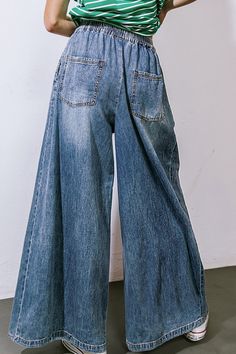 A washed denim pant featuring elasticized waist, contrasting front tie, side pockets and extra wide legDetails:Self : 100% CottonSize & Fit- Model is 5`8" And Wearing Size Small- Measurements Taken From Size Small- Approx. Length: 41" Baggy Wide Leg Washed Blue Cargo Jeans, Baggy Wide Leg Cargo Jeans In Faded Color, Faded Baggy Wide Leg Cargo Jeans, Baggy Faded Wide Leg Cargo Jeans, Faded Baggy Wide-leg Cargo Jeans, Faded Wide Leg Flare Jeans With Pockets, Denim Blue Wide-leg Flare Jeans With Pockets, Faded Wide-leg Flare Jeans With Pockets, Baggy Wide Leg Faded Pants