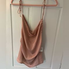 Size Small, Nwt, Fabric Is Silky, Breathable. Synched Sides, Gold Accents On The Ties. Can Be Worn Many Different Ways Depending How You Tie It! Color Is Blush/Nude/Pinkish Chic Pink Camisole For Day Out, Pink Sleeveless Top For Date Night, Pink Casual Party Camisole, Casual Pink Camisole For Night Out, Halter Tie Top, Free People Tank Top, Free People Tank, Small Boho, Striped Crop Top