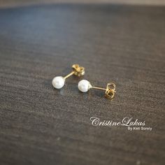 This classic mini pearl earrings will be amazing addition to any collection or occasion. Stud earrings are great for everyday wear or special occasions. Make a great gift for kids and women of any age. Pearl Size: 4 mm Pearl: White Crystal Pearl Metal: 14/20 Gold Filled  Please allow 3-5 business days for production. Classic White Birthstone Earrings, Hypoallergenic Pearl White Earrings For Gift, Tiny Elegant Pearl Earrings For Gifts, Classic Tiny Earrings For Anniversary, Dainty Nickel-free Pearl Earrings For Anniversary, Classic Hypoallergenic Earrings As A Gift, Elegant White Earrings For Birthday, Elegant White Earrings For Birthdays, Pompano Beach