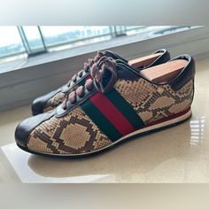 Authentic Python Gucci Sneakers Designer Brown Sneakers With Round Toe, Designer Brown Sneakers With Rubber Sole, Designer Brown Round Toe Sneakers, Gucci Leather Sneakers With Abzorb Midsole, Gucci Casual Calf Leather Sneakers, Casual Gucci Calf Leather Sneakers, Gucci Leather Sneakers With Leather Sole, Gucci Luxury Custom Sneakers With Contrast Sole, Gucci Brown Sneakers With Branded Heel Counter