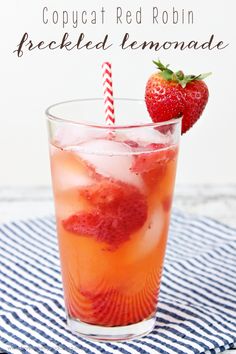 a drink with ice and strawberries in it