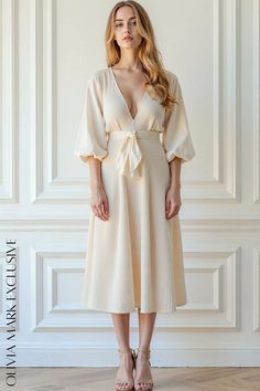 Olivia Mark - Elegant V-Neck Wrap Midi Dress with Tie Waist and Puffed Sleeves Understated Luxury, Wrap Midi Dress, Dress With Tie, Neck Wrap, Puffed Sleeves, Olivia Mark, Timeless Pieces, Puff Sleeves, Elegant Dresses