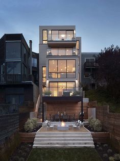 an exterior view of a modern home at dusk