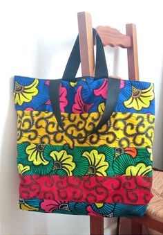 The Zemstore store is happy to present its 1st tote bag made from scrap fabrics from African loincloths! Therefore, each model will be unique since we recover all the strips of fabric at our disposal to make these magnificent accessories. This bag can be used as a tote, shopping bag, travel bag, sports bag, etc. 👜Here is some additional information below: ✔ Bag length: 50 cm ✔ Width: 40cm ✔ Polyester lining ✔ Length of the handles: 100 cm ✔ Width of the handles: 4 cm ✔ No closure This bag will Multicolor Patchwork Tote Bag, Eco-friendly Upcycled Multicolor Bag, Multicolor Fabric Shoulder Bag With Double Handle, Multicolor Double Handle Fabric Shoulder Bag, Eco-friendly Patchwork Bags For Daily Use, Multicolor Fabric Tote Canvas Bag, Multicolor Fabric Bag With Double Handle, Multicolor Fabric Bags For Everyday Use, Multicolor Patchwork Bags For Shopping