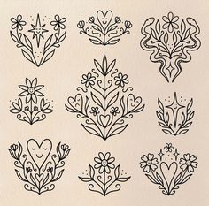 a bunch of flowers that are drawn on paper