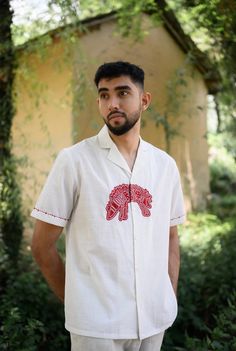 We have a crush on this shirt, because of its kooky hand detailed hand embroidered applique. Crafted in cotton, it also features embroidery details on the sleeves. This product is handcrafted in Pune, India. Subtle variations in patterns are natural to this process. We believe this makes each creation unique and charming. Men Shirts Embroidery, Mens Shirt Illustration, Mens Shirts Design Ideas, Men Embroidery Shirts, Embroidery Designs Shirts, Embroidery Kurta For Men, Shirt Embroidery Ideas For Men, Embroidery Shirt Ideas, Embroidery Shirt Designs