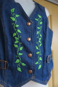 "Vintage embroidered denim vest. In good vintage condition!!. No size labeled but looks to be a small/medium. Please check measurements to ensure fit. measurements taken across front laid flat 19\" across front armpit to armpit 16.5\" across front of waist 20\" length top of shoulder to bottom" Fitted Vintage Vest With Embroidery, Vintage Fitted Embroidered Vest, Vintage Embroidered Fitted Vest, Fitted Cotton Vest With Embroidery, Fitted Embroidered Cotton Vest, Fitted Cotton Embroidered Vest, Fitted Cotton Vest With Floral Embroidery, Vintage Fitted Medium Wash Vest, Black Tutu Skirt