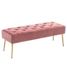 a pink bench with gold legs on a white background