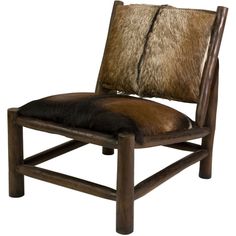 a wooden chair with a cowhide seat pad on it's armrests