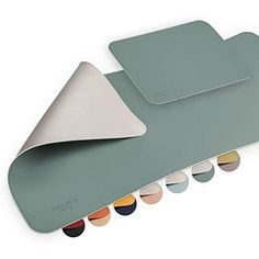 a set of four placemats with different colors and shapes on each one side