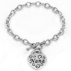 A lovely gift idea for the person who’s always been there for you. Designed with high polish oxidized stainless steel  this beautiful bracelet features an engraved heart shaped charm with your choice of “Mom”  “Nana”  “Grandma”  “Sister” or “Daughter.” This statement piece secures with a trendy toggle clasp. Show her how much you care with this gorgeous accessory! Mother's Day Engraved Stainless Steel Name Bracelet, Personalized Silver Name Bracelet With Heart Shape, Silver Heart-shaped Name Bracelet For Personalized Gift, Silver Heart Name Bracelet For Personalized Gift, Personalized Silver Stainless Steel Heart Bracelet, Silver Name Bracelet With Heart Charm, Silver Name Bracelet With Heart Charm As Gift, Silver Name Bracelet With Heart Charm For Gift, Personalized Silver Heart Name Bracelet