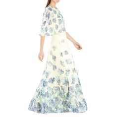 An elegant overlay and romantic floral print enrich this beautiful, vintage-inspired garden party dress Round neckline. Elbow-length sleeves. Bodice overlay. Fitted through upper thigh. Floor-length hemline. Allover signature Honeysuckle Floral print. Concealed center back zipper with hook-and-eye closure. Self/Contrast: Polyester georgette. Lining: Polyester, Spandex. Machine Wash. Romantic Floral Print, Tier Dress, Garden Party Dress, 2015 Trends, Round Neck Top, Runway Dresses, Fabulous Dresses, Trending Today, Round Neck Tops