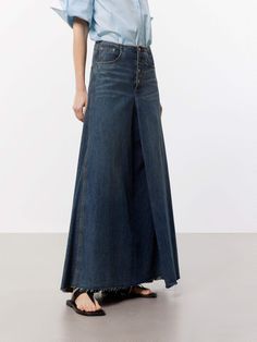 MO&Co. Women's A-line Maxi Denim Skirt This denim skirt features an A-line maxi silhouette, a flattering and versatile style that falls gently away from the body. Crafted from premium cotton, this skirt features a pleated and raw hem design that adds a unique and trendy touch, while the deep blue hue gives it a classic and timeless look. Pair with a cute top or tucked-in blouse for a chic outfit. Features : - Mid waist A-line maxi silhouette- Classic five pocket design- Pleated and raw hem desig Maxi Denim Skirt, 2024 Wardrobe, Denim Maxi Skirt, Chic Outfit, Mesh Bag, Versatile Style, The Deep, Blue Hues, Cute Tops