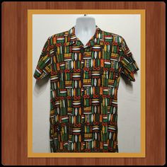 "Americana 1950s style rayon atomic / tiki print shirt  By Atomik Tiki   The shirt's rayon fabric has tiki style images in shades of oranges, yellows, browns, white, black and greens. The shirt has a pointed loop collar, one left pattern patch pocket, and a five coconut button down front with short sleeves. The label states Atomik Tiki.  The shirt is in new condition with tags still attached.  The shirt is currently available in sizes medium, large, X large and XX large MEASUREMENTS: (All measur Short Sleeve Shirt With Retro Multicolor Print, Retro Multicolor Shirt For Vacation, Multicolor Retro Print Short Sleeve Shirt, Retro Cotton Hawaiian Shirt With Retro Print, Retro Multicolor Print Beach Tops, Retro Multicolor Print Tops For Beach, Retro Hawaiian Shirt With Graphic Print, Retro Graphic Print Hawaiian Shirt, Retro Multicolor Printed Hawaiian Shirt