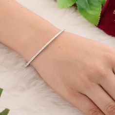 10k White Gold Diamond Bangle, Unique Designer Micro Pave Diamond Bracelet, 1.10 Carats Diamond Pave Gold Bangle Jewelry Gift for Her Details :- Item Code:- STB-6001 Gross Weight :- 7.89 gm 10k White Gold Weight :- 7.67 gm Diamond Weight :- 1.10 ct. (Si Clarity Hi Color Certified Diamonds) ≫ FAQ below for more detail. ✦ Sizing We can adjust most items to fit your sizing preferences. Most items can be made to any size and length. Please leave a note at checkout or contact us via Etsy conversation Dainty Tennis Bracelet Bangle For Anniversary, Diamond White Jubilee Bracelet As A Gift, White Diamond Jubilee Bangle Bracelet, White Stackable Diamond Bracelet, Anniversary Sterling Silver Bracelet, White Tennis Bracelet Bangle As Gift, White Tennis Bangle Bracelet As Gift, White Crystal Bangle Bracelet For Anniversary, White Tennis Bangle Bracelet For Gift