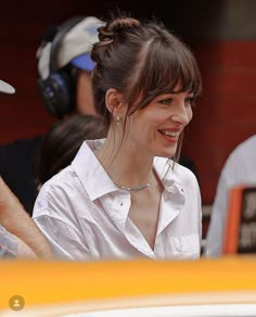 Dakota Johnson Hair Up, Fringe Dakota Johnson, Fringe Bangs In Ponytail, Dakota Johnson Dark Brown Hair, Hair Up Fringe, Rashida Jones Bangs, Thick Straight Bangs, Dakota Johnson Jewelry, Dakota Johnson Bangs Tutorial