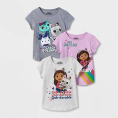 Dress up your toddler in cute style in this 3-Pack of Short-Sleeve Gabby's Dollhouse T-Shirts. Crafted from a soft fabric blend, these printed T-shirts bring cool comfort to their day. The set includes three crewneck tee, each featuring different fun prints of Gabby and her cat friends to excite your little one. A fun pairing with anything from shorts or jeans to leggings or skirts, you can help them layer these shirts under zip-up hoodies or jackets for cozy styling when the temperatures drop. Gabbys Dollhouse Clothes, Sixth Birthday, Dollhouse Clothes, Cat Friends, Barbie Doll Set, Sprinkle Party, Cat Birthday Party, Weather Wear, Cat Birthday