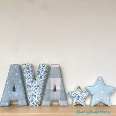 the word ava spelled with blue and white stars