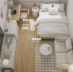 an aerial view of a bedroom with white furniture