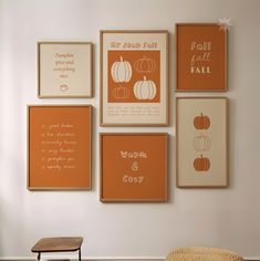 there are many framed pumpkins on the wall