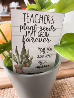 a potted plant with a sign that says teachers plant seeds that grow forever thank you for a great year