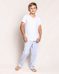 The sleepwear is made from the finest quality yarn-dyed cotton and blended with just enough inherently flame retardant fiber to allow it to pass strict CPSC flame retardant laws without using harmful chemicals. The fabric is brushed for added softness, making the sleepwear feel absolutely luxurious, getting cozier after each wash. In our luxurious sleepwear, your little one will be tucked in love and off to dreamland. Bonne nuit. Cotton Gingham Bottoms For Loungewear, Luxurious Sleepwear, Brand Direction, Light Blue Gingham, Tartan Pants, Luxury Sleepwear, Childrens Lighting, Kids Pjs, Boys Pajamas