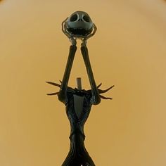 a strange looking object with two arms and legs