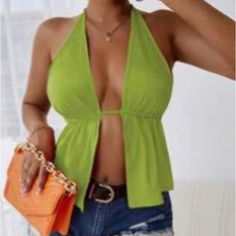 Green Sexy Plain Halter. Halter Backless, Knot, Split Flared Regular. Regular Fit Medium Stretch Fabric 90% Polyester, 10% Elastane. True To Size Spring Club Halter Top With Built-in Bra, Solid V-neck Halter Top For Party, V-neck Halter Top For Party, Green Stretch Backless Crop Top, Chic Low-cut Summer Tank Top, Trendy Low-cut Tank Top For Summer, Green Backless Crop Top, Spring Party Low-cut Tank Top, Green Halter Neck Tank Top For Night Out