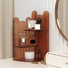 a shelf with candles and other items in front of a mirror