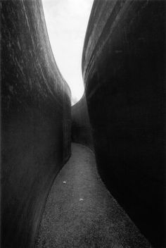 black and white photograph of two narrow alleys