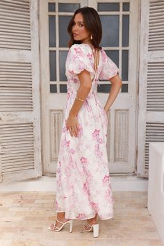 Length from shoulder to hem of size S: 133cm. Chest 38cm, Waist 32cm, across front only of size S. Maxi dress. Pink/purple print. Lined. Model is a standard XS and is wearing size XS. True to size. Non-stretch. Elastic puff sleeves. Tie-up back. Elastic back V-neck. Print placement may vary. Zipper. Cold hand wash only. Polyester/Spandex. Elevate your look with the One To Love Maxi Dress. Featuring dreamy elastic puff sleeves and a tie-up back design. Style with heels for a fancy day 'fit. Floral Pastel Dress, Maxi Dress White, Rose Violette, Bridal Shower Dress, Long Bodycon Dress, Shower Dresses, Long Sleeve Lace Dress, Print Placement, Grad Party