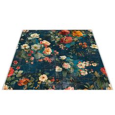 a blue rug with flowers on it