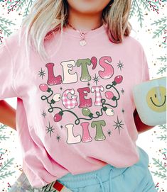 Looking for the perfect christmas gift? Look no further than our pink let's get lit christmas shirt! This festive top is perfect for celebrating the holidays with your loved ones. Not to mention, the festive graphics make it the perfect addition to any christmas outfit. Get yours today! * Q U I C K * F A C T S * ✺ 100% ring-spun cotton ✺  Medium fabric (6.1 oz/yd² (206.8 g/m ✺ Wash and dry normally (on cool for best results) ✺ Product color may slightly vary due to photographic lighting sources or your monitor settings  * S I Z I N G * ✺ Sizing is unisex so runs like men's. ✺ Most women find their typical size works best, since they are meant to fit a touch loose and go up 1 or 2 sizes if you want the oversized look. ✺ Size guide and fit:  The size chart is listed in photos above.  Please Pink Christmas Shirt, Little Sister Gifts, Lets Get Lit, Womens Christmas Shirts, Womens Christmas, Nurse Christmas, Make Her Smile, Festival Tops, Comfort Colors Shirt